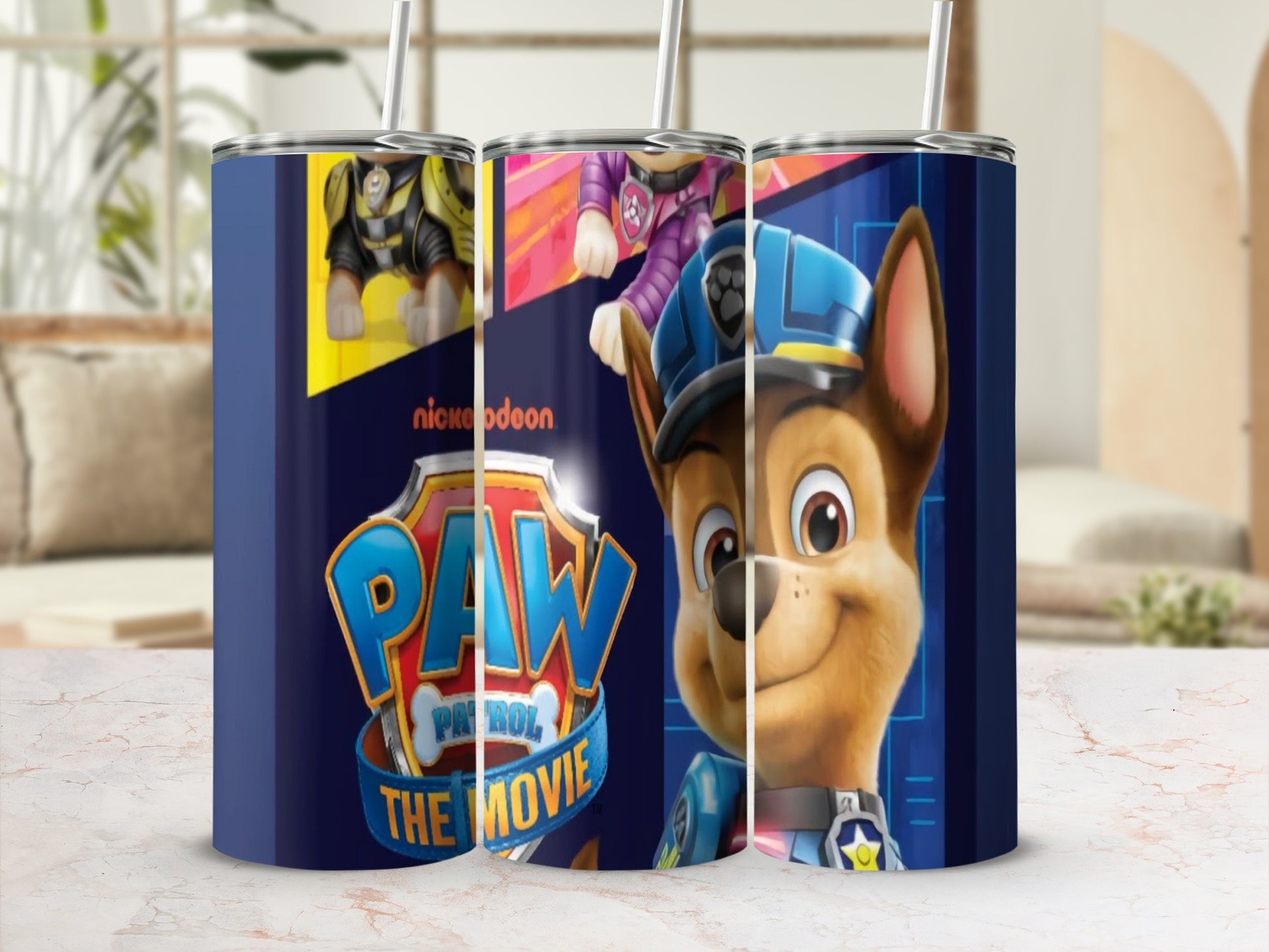 Paw Patrol The Movie Chase character with Nickeloden logo on navy blue tumbler.