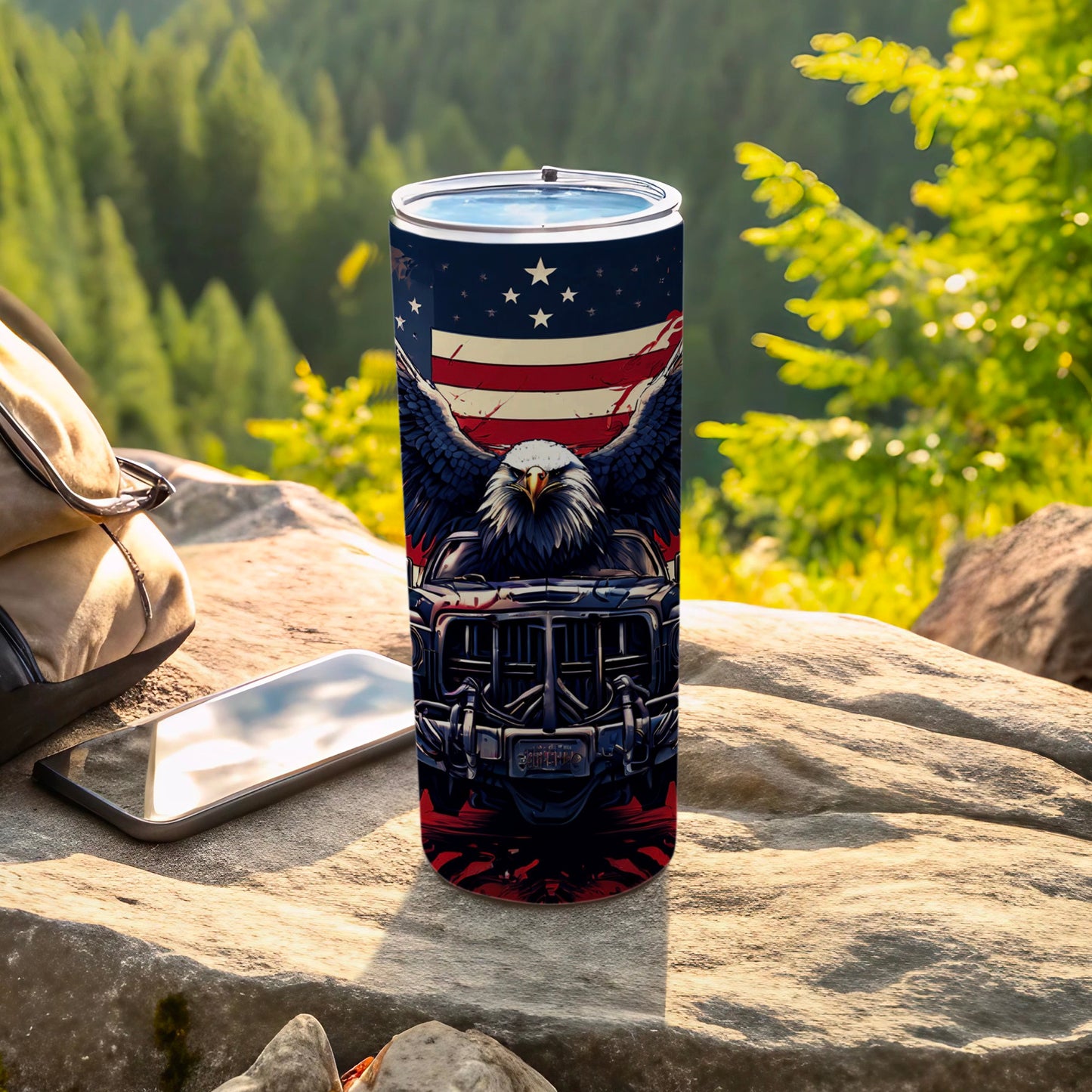 Tumbler with American flag, eagle, and truck graphic, outdoors.