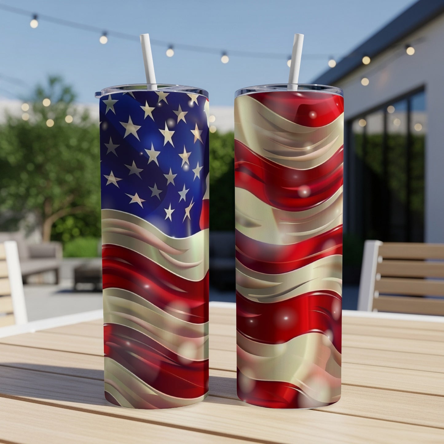Two tumblers with American flag design stand on a table outdoors.