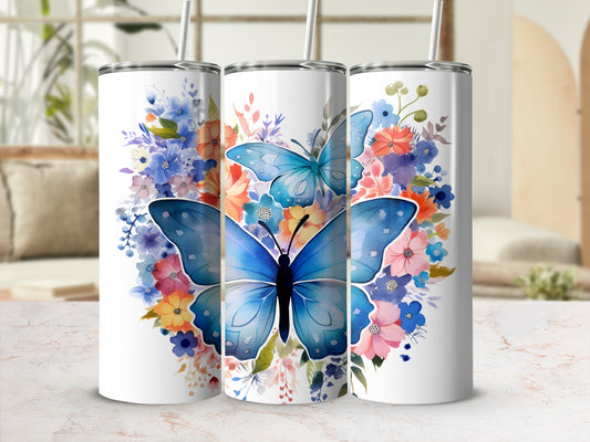 White tumbler with blue butterfly and floral watercolor design.