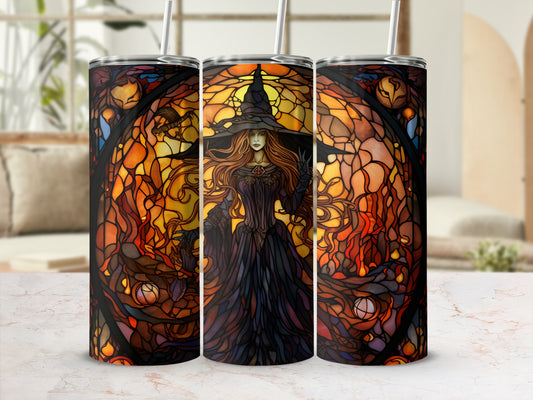Stained glass witch illustration on three tumblers against a blurred background.