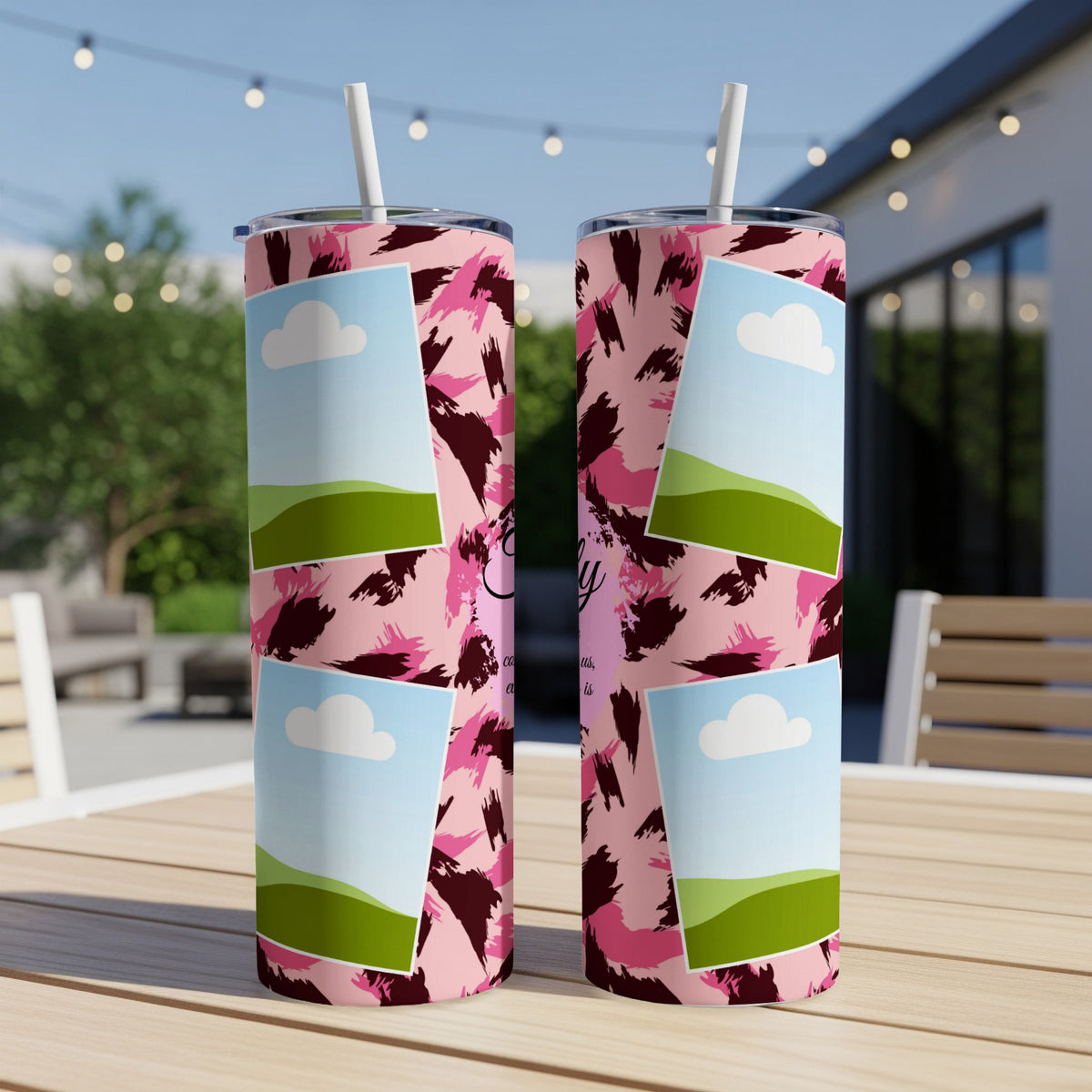 Two tumblers with pink leopard print and photo frames sit on a table.