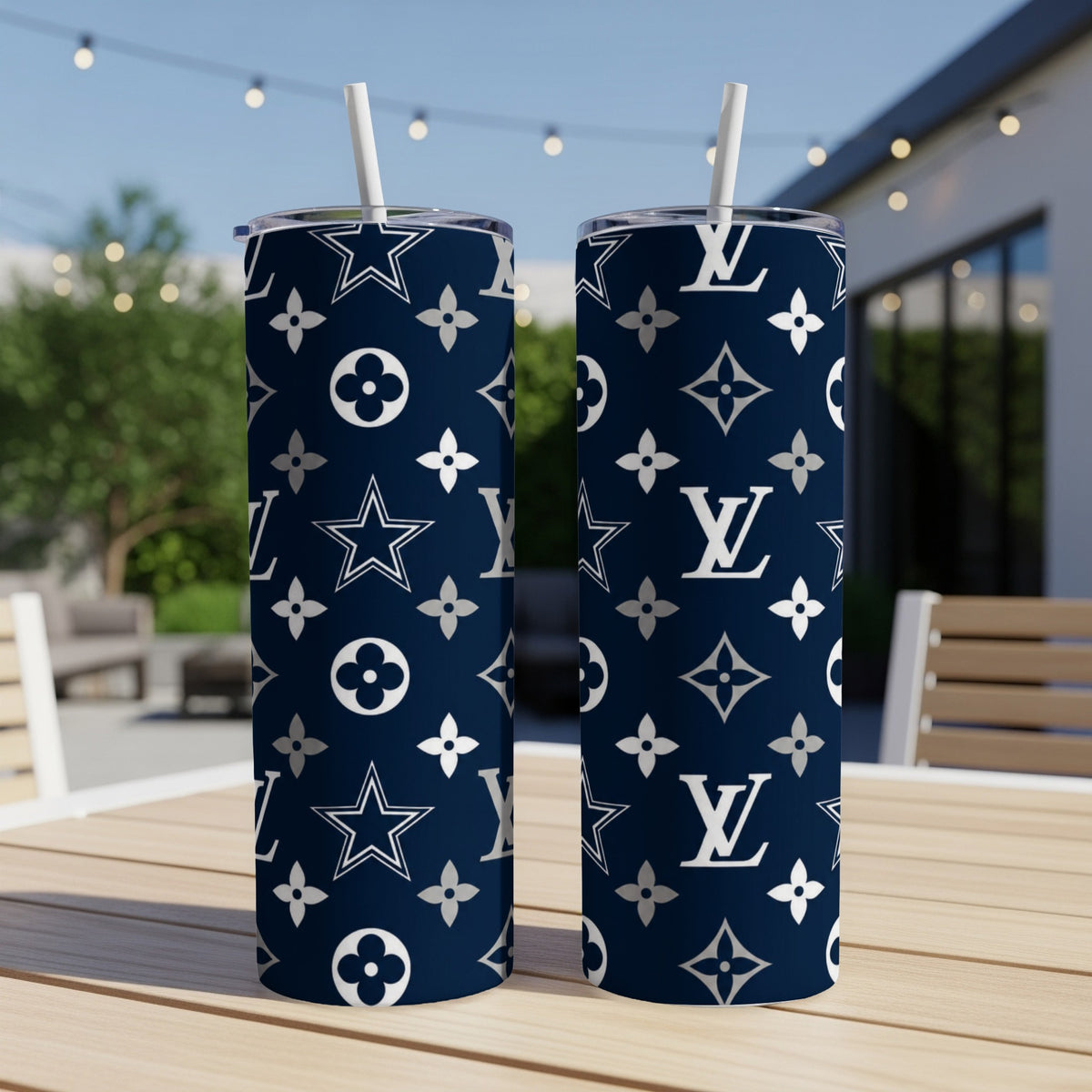 Navy tumblers with white Dallas Cowboys stars and LV monogram patterns.