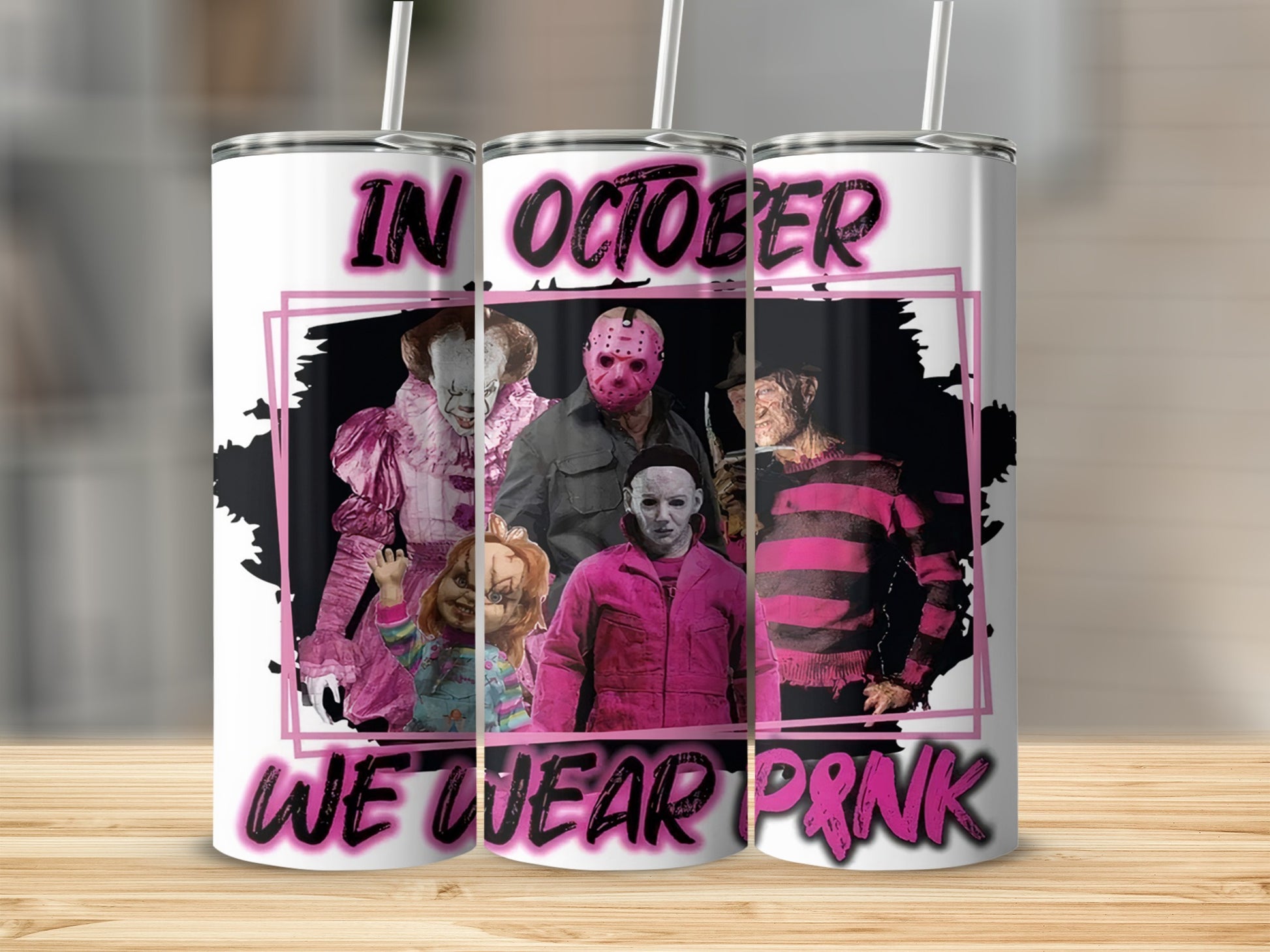 Horror characters in pink text "In October We Wear Pink".