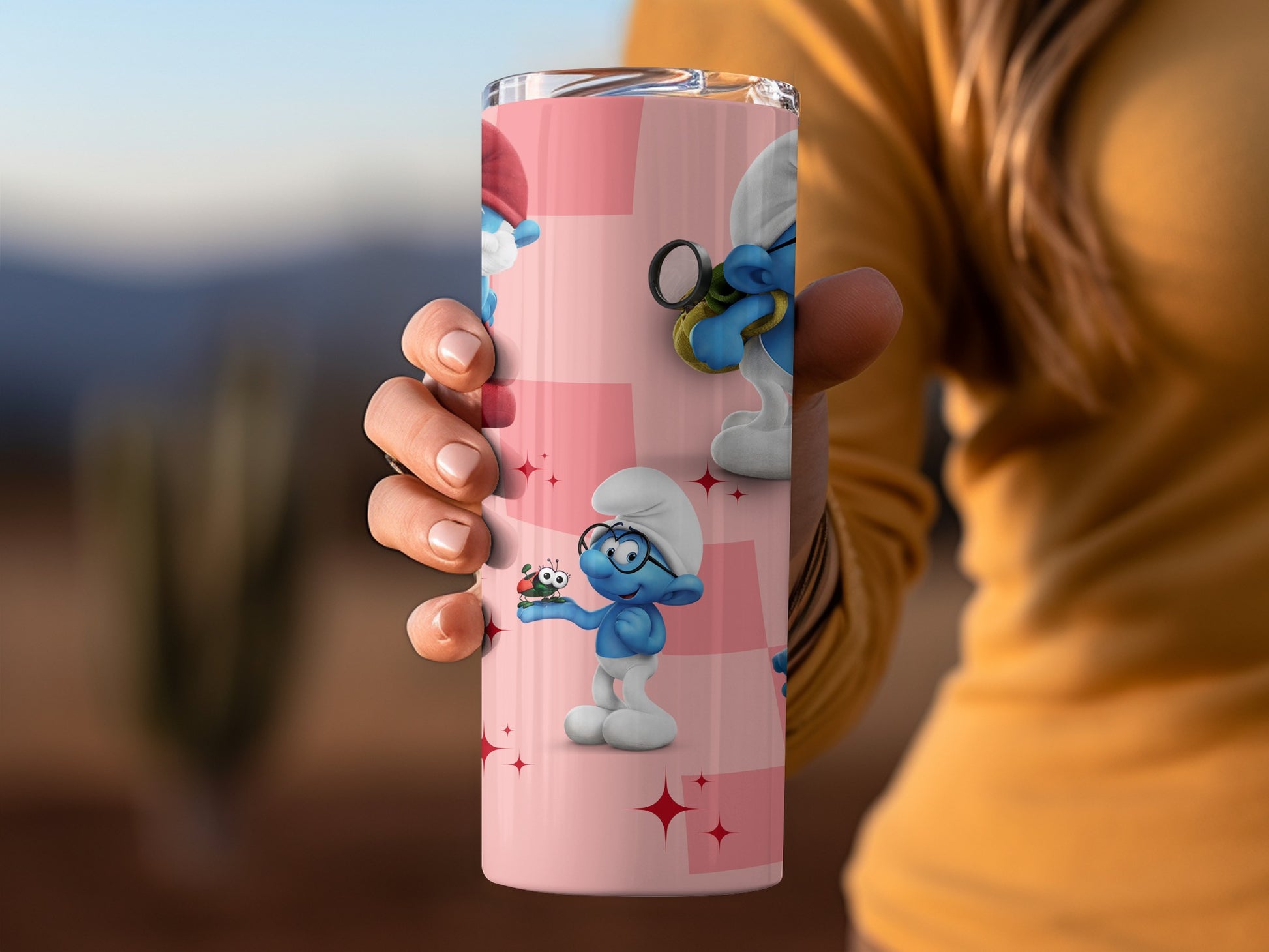 Smurfs Design Tumbler With Pink Background
