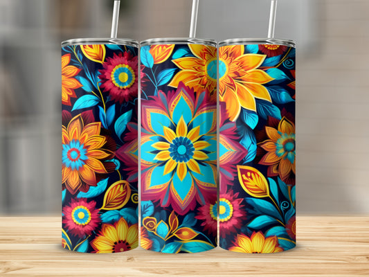 Three tall tumblers with vibrant floral mandala patterns on a wooden surface.