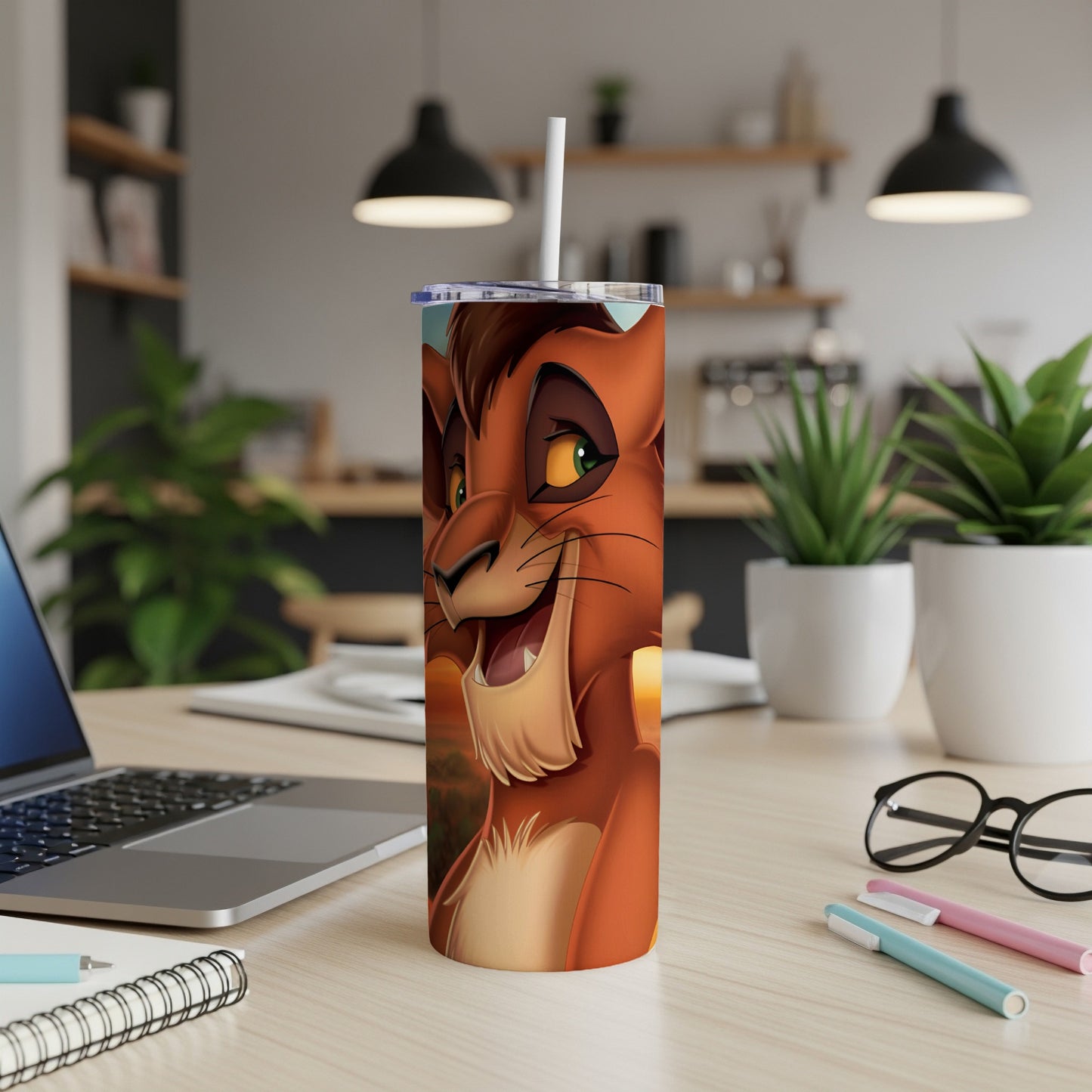 Kion character illustration on a tumbler with a straw.