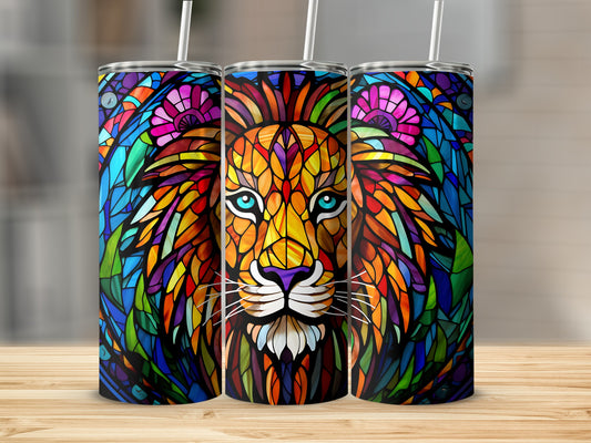 Colorful stained-glass lion face design on three tumblers with straws.