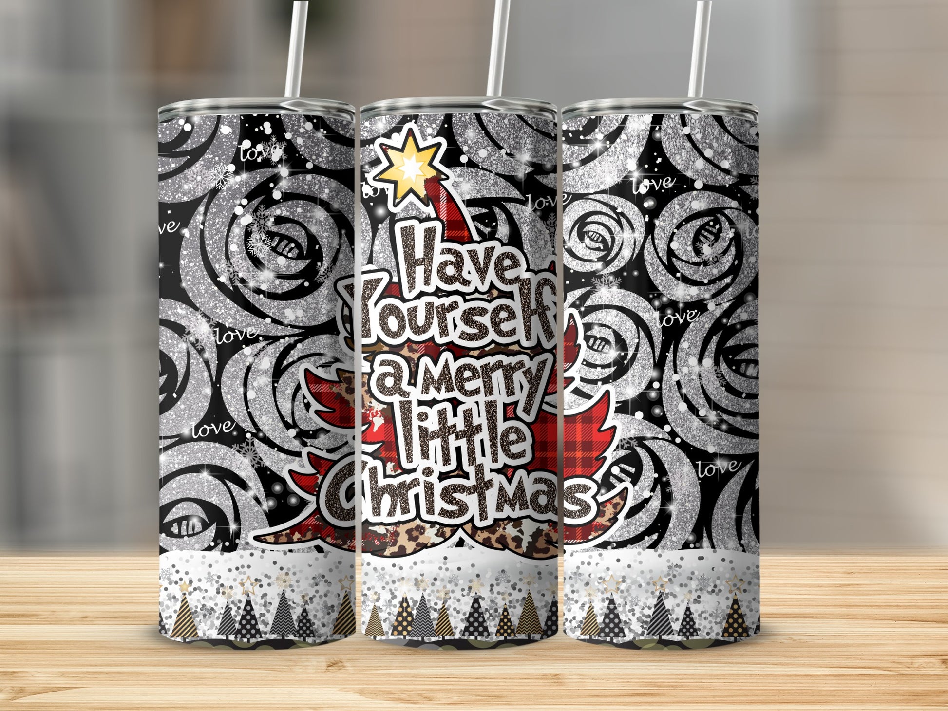 Tumbler with "Have yourself a Merry little Christmas" text, glitter, and animal print.