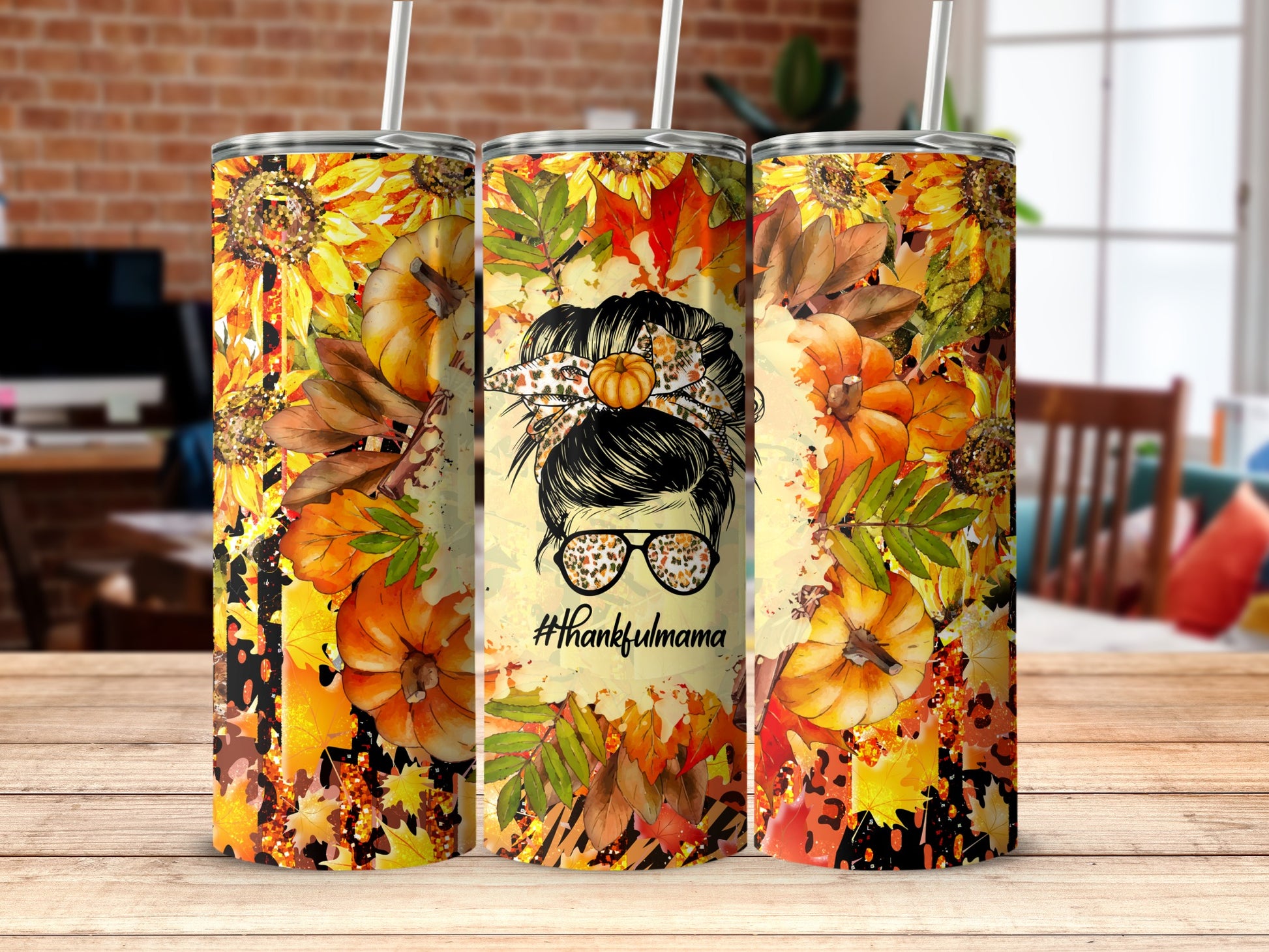 Tumbler with thankful mama, pumpkins, sunflowers, and autumn leaves.