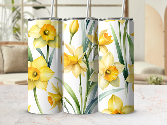 Three tumblers with a watercolor daffodil pattern.