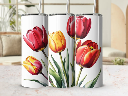 Three tumblers featuring red and yellow tulips against a blurred background.