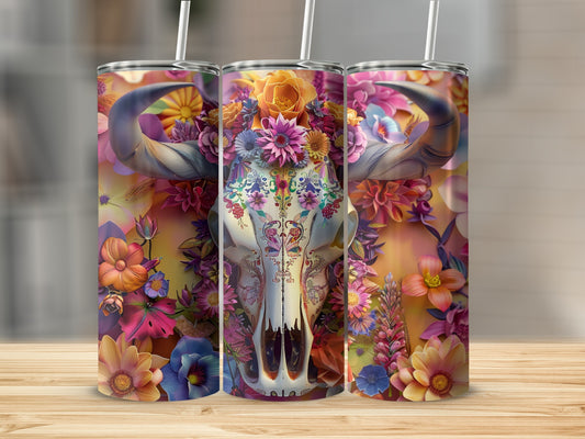 Floral skull tumbler with colorful flowers on a wooden surface.