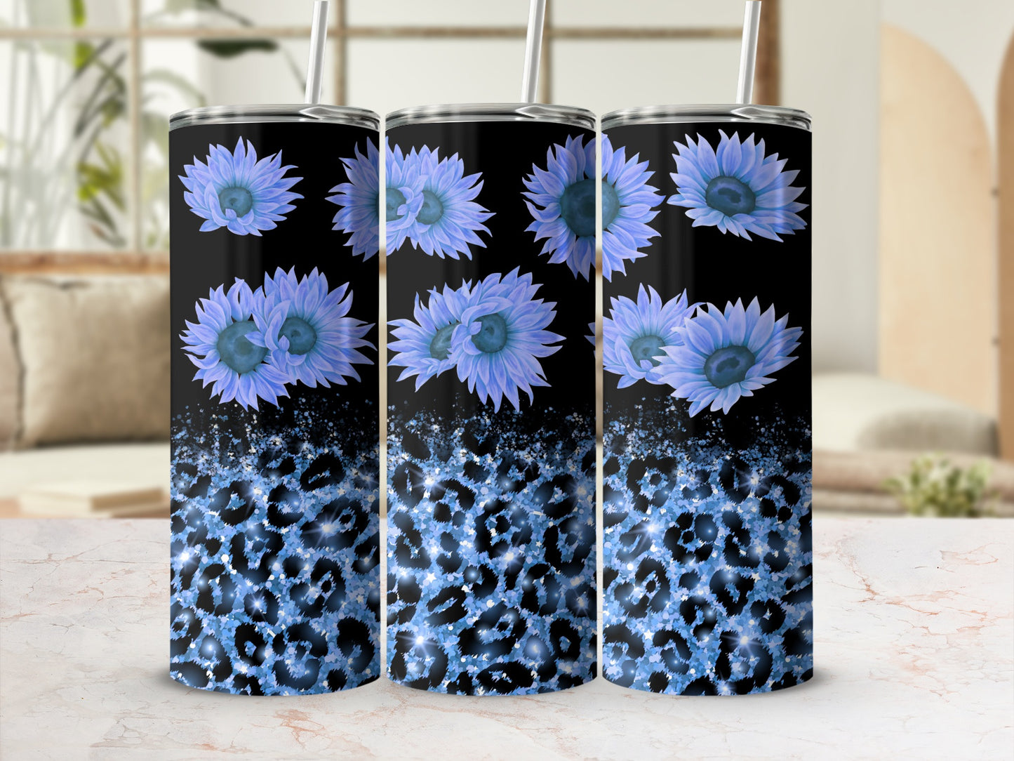 Black tumbler with blue flowers and blue leopard print.