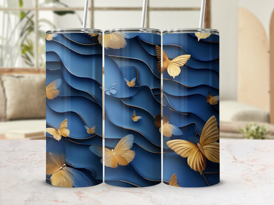 Gold and blue butterflies on a wavy blue background, three tumblers.