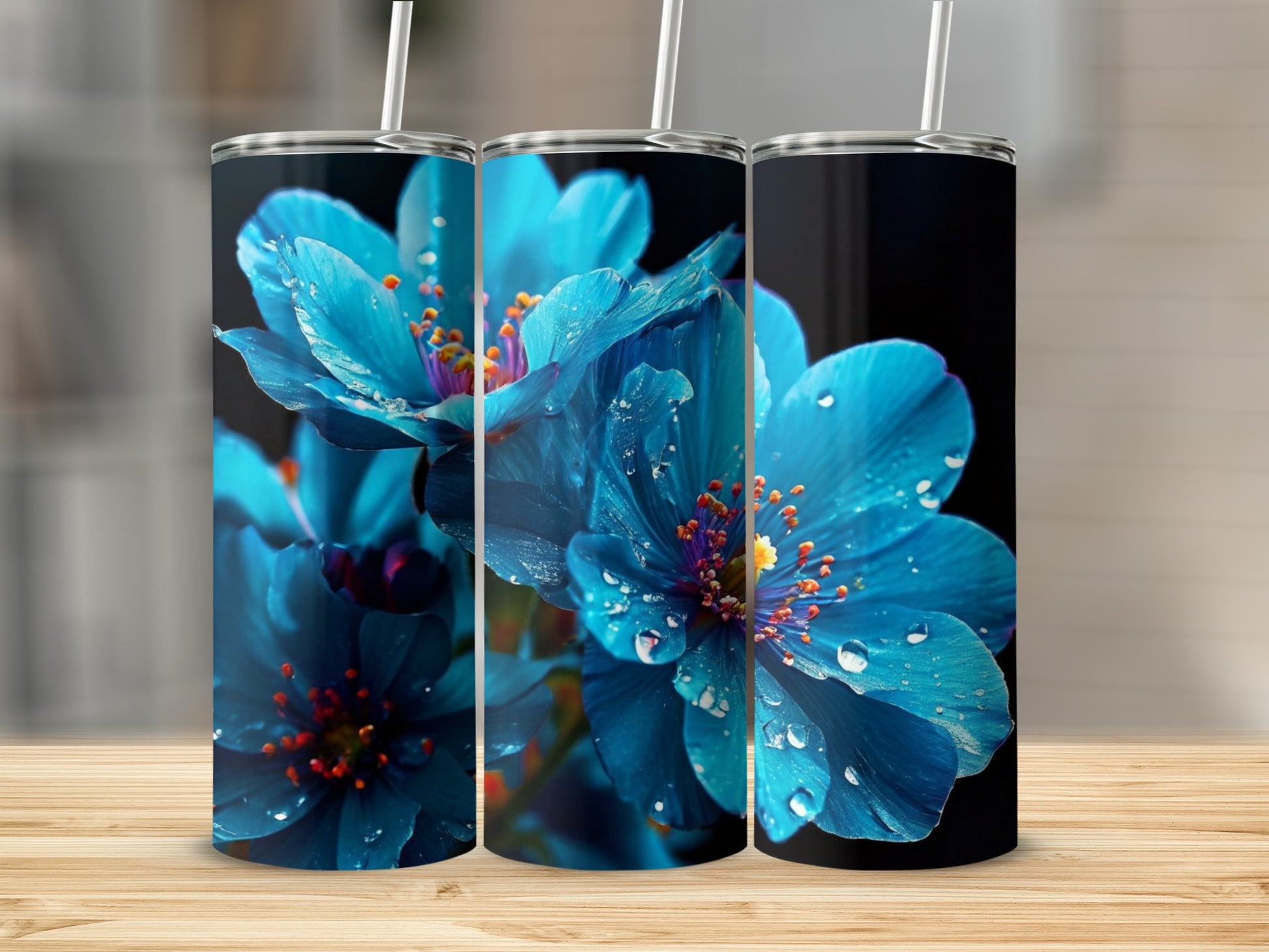 Three tumblers displaying close-up of vibrant blue flowers with water droplets.