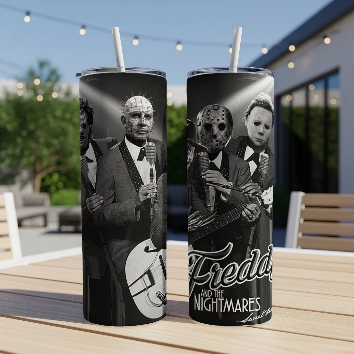 Horror characters Pinhead, Jason Voorhees, and Michael Myers on a black tumbler.