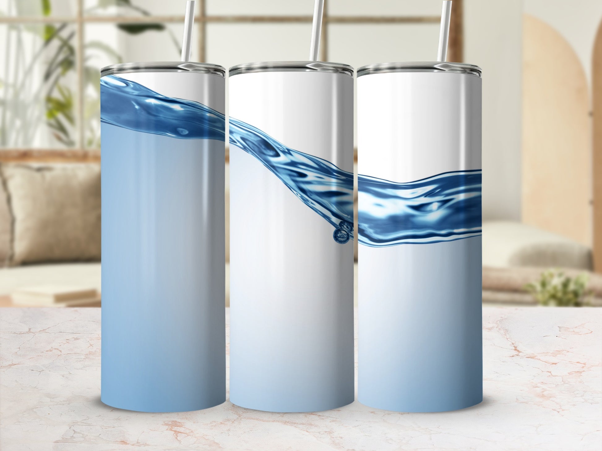 Three tumblers with a blue water wave design and straws.