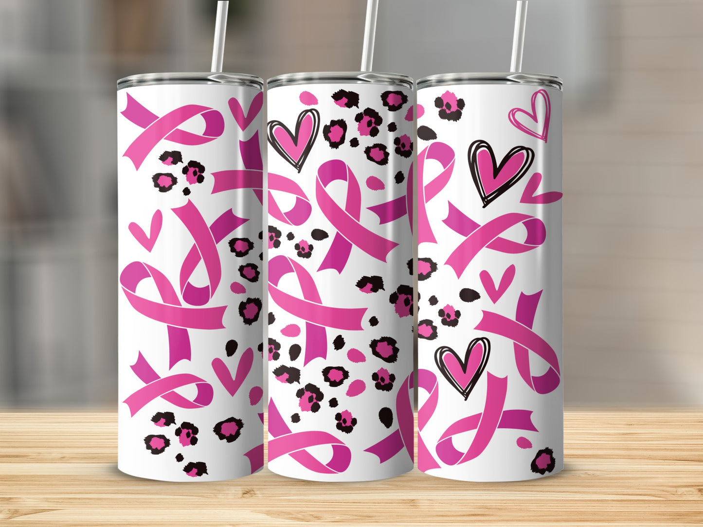 Pink breast cancer ribbons and hearts on leopard print tumbler.