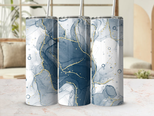 Three tumblers with abstract blue and gold marble pattern.