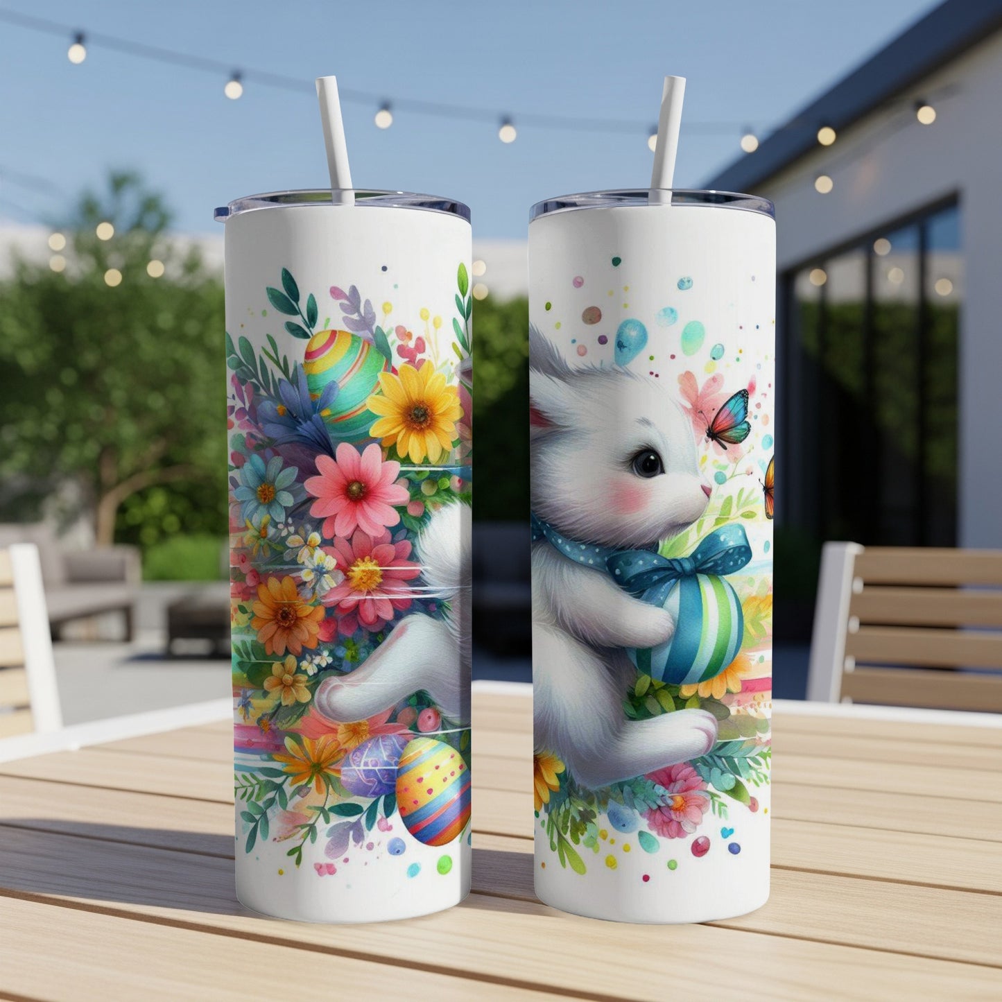 White cat with blue ribbon holding Easter egg, surrounded by flowers and butterflies.
