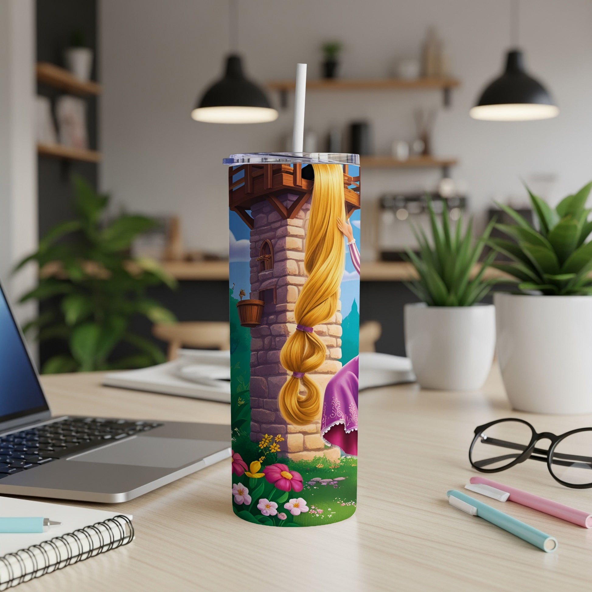 Rapunzel's tower with long blonde hair, on a desktop with a laptop and pens.