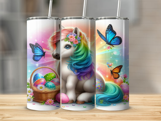 Unicorn with rainbow mane and tail, surrounded by Easter eggs and butterflies.
