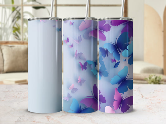 Three tumblers with butterfly designs in shades of blue and purple.