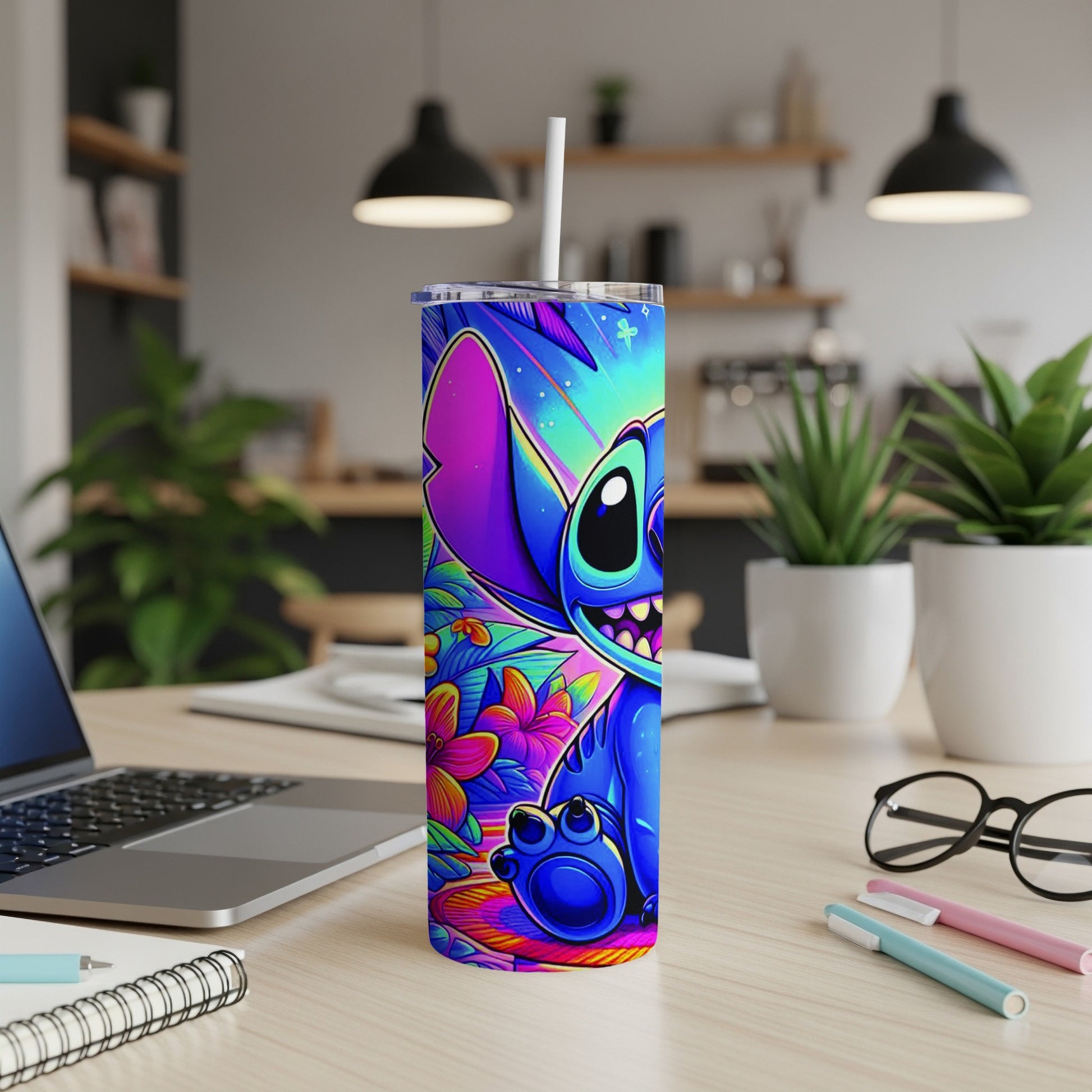 Blue Stitch character with colorful floral background on a tumbler.