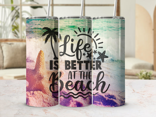 Beach scene tumbler with "Life is Better at the Beach" text.