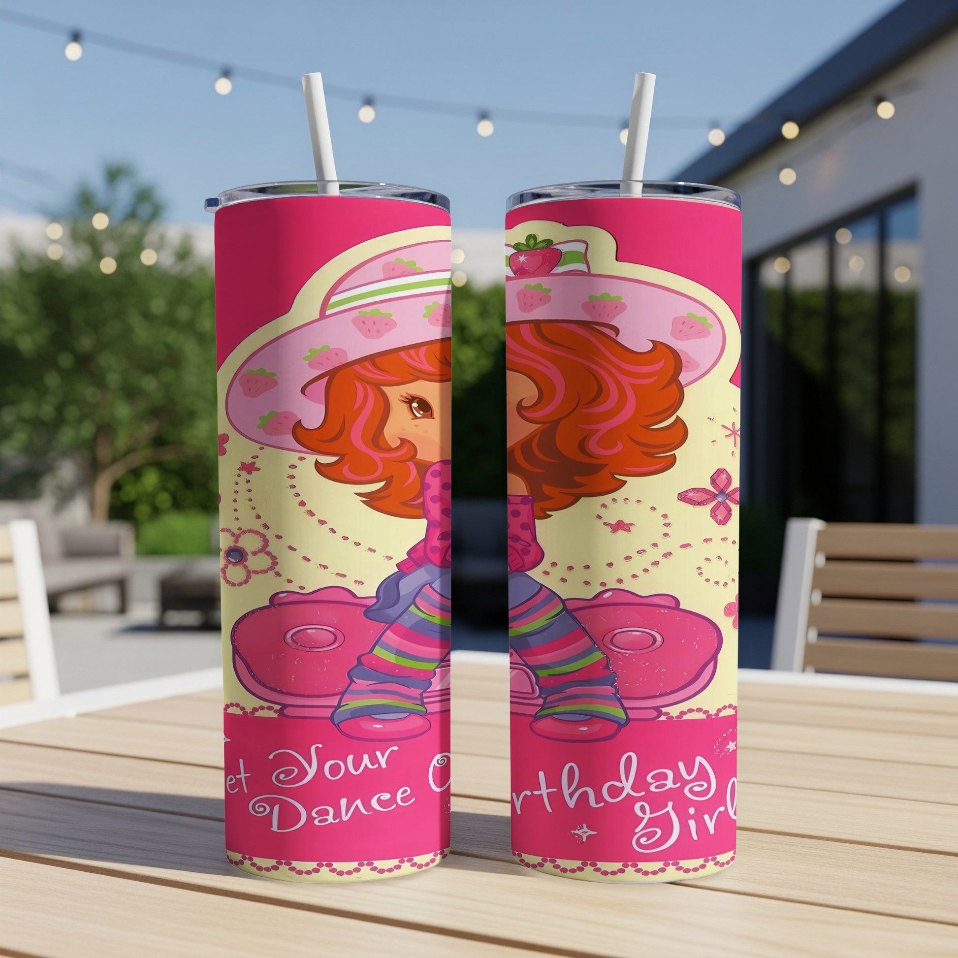 Strawberry Shortcake character on a pink tumbler with striped socks and "Birthday Girl" text.