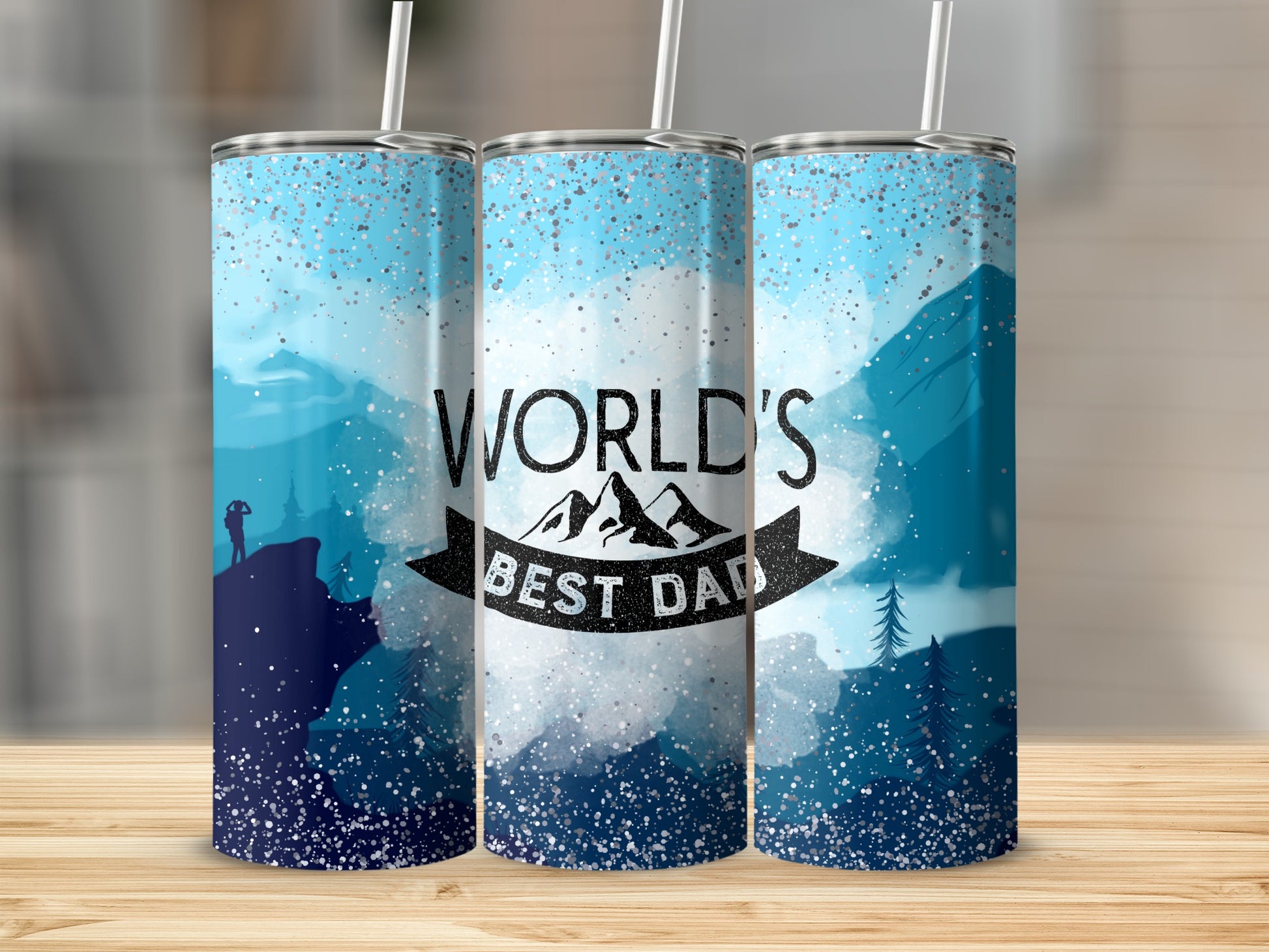 Tumblers with watercolor mountain scenes and "World's Best Dad" text.