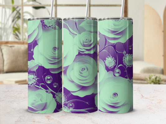 Three mint green tumblers with rose floral pattern on a marble surface.