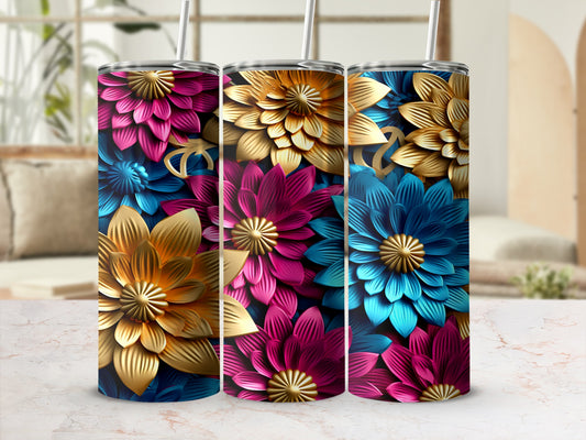 Three tumblers with floral designs in pink, gold, and blue.