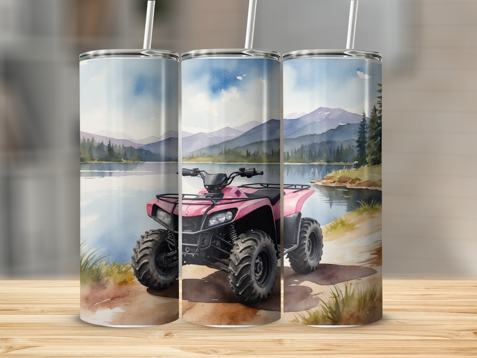 Pink ATV on a lake shore with mountains in the background.