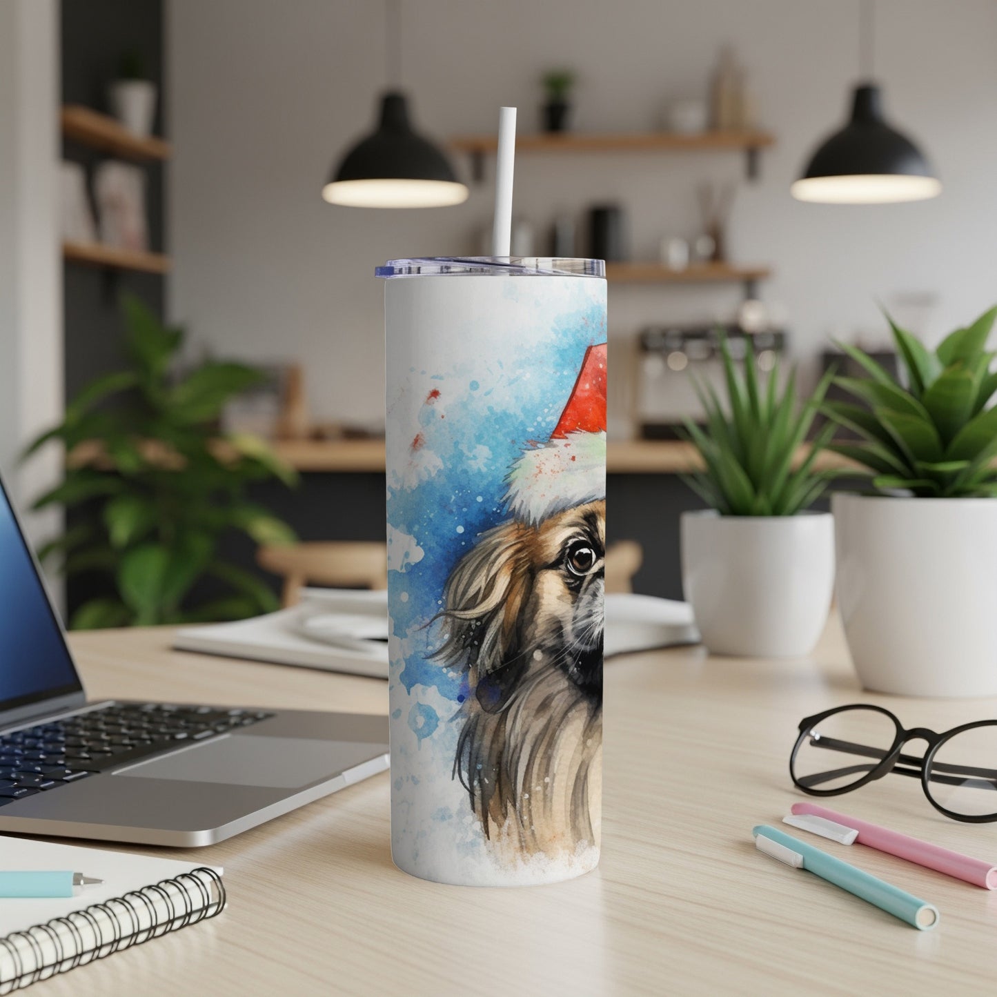 Watercolor dog with Santa hat on a white tumbler with straw.