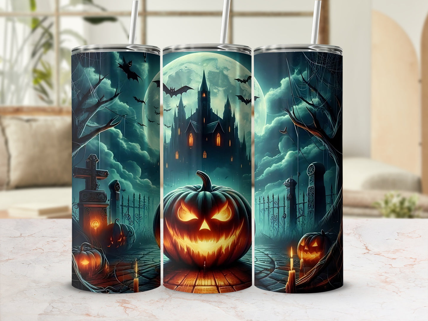 Halloween tumblers with spooky castle, jack-o'-lanterns, bats, and gravestones.