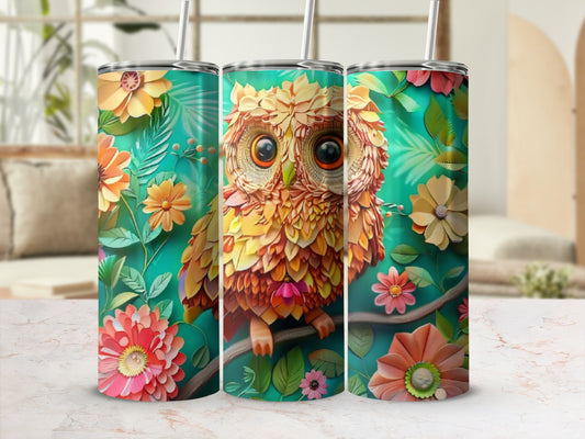Tangerine and teal owl with floral patterns on a tumbler.