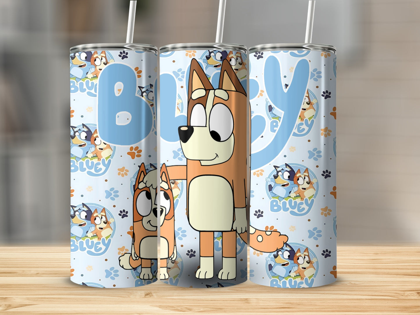 Bluey characters on a light blue patterned tumbler.