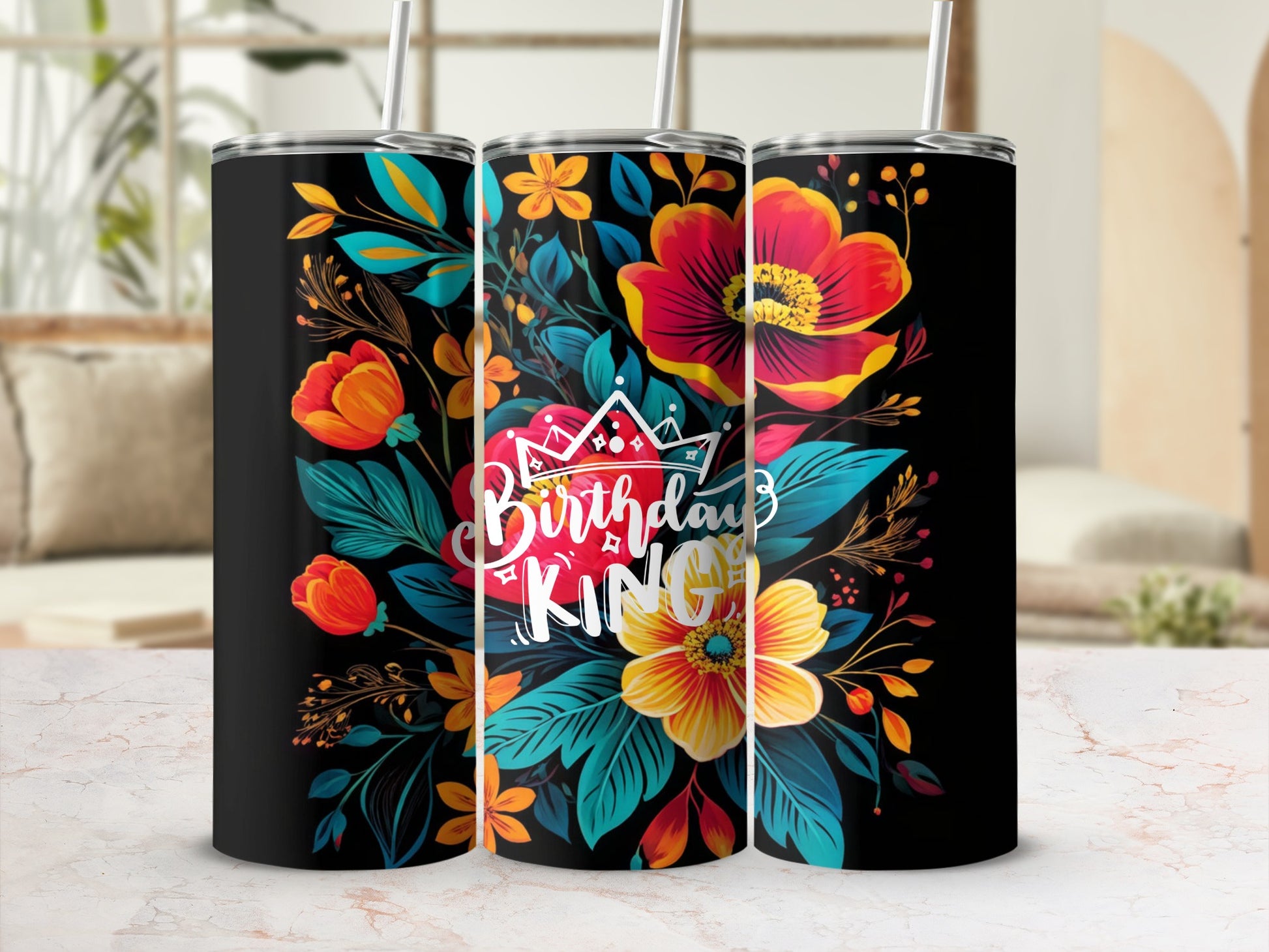 Black tumbler with "Birthday King" text and vibrant floral design.