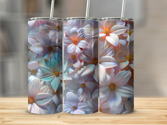 Three tumblers with iridescent floral patterns on a wooden surface.