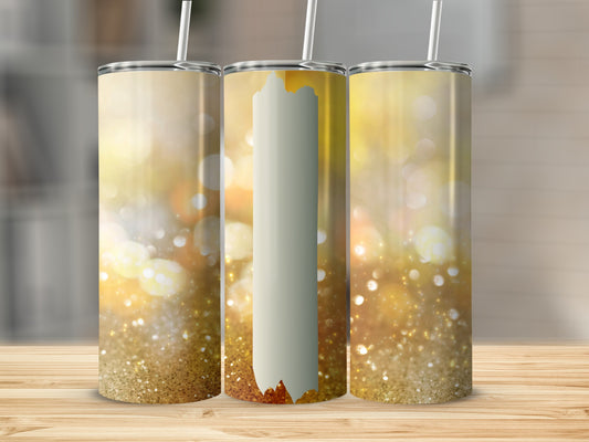 Three tumblers with gold glitter and bokeh background on a wooden surface.