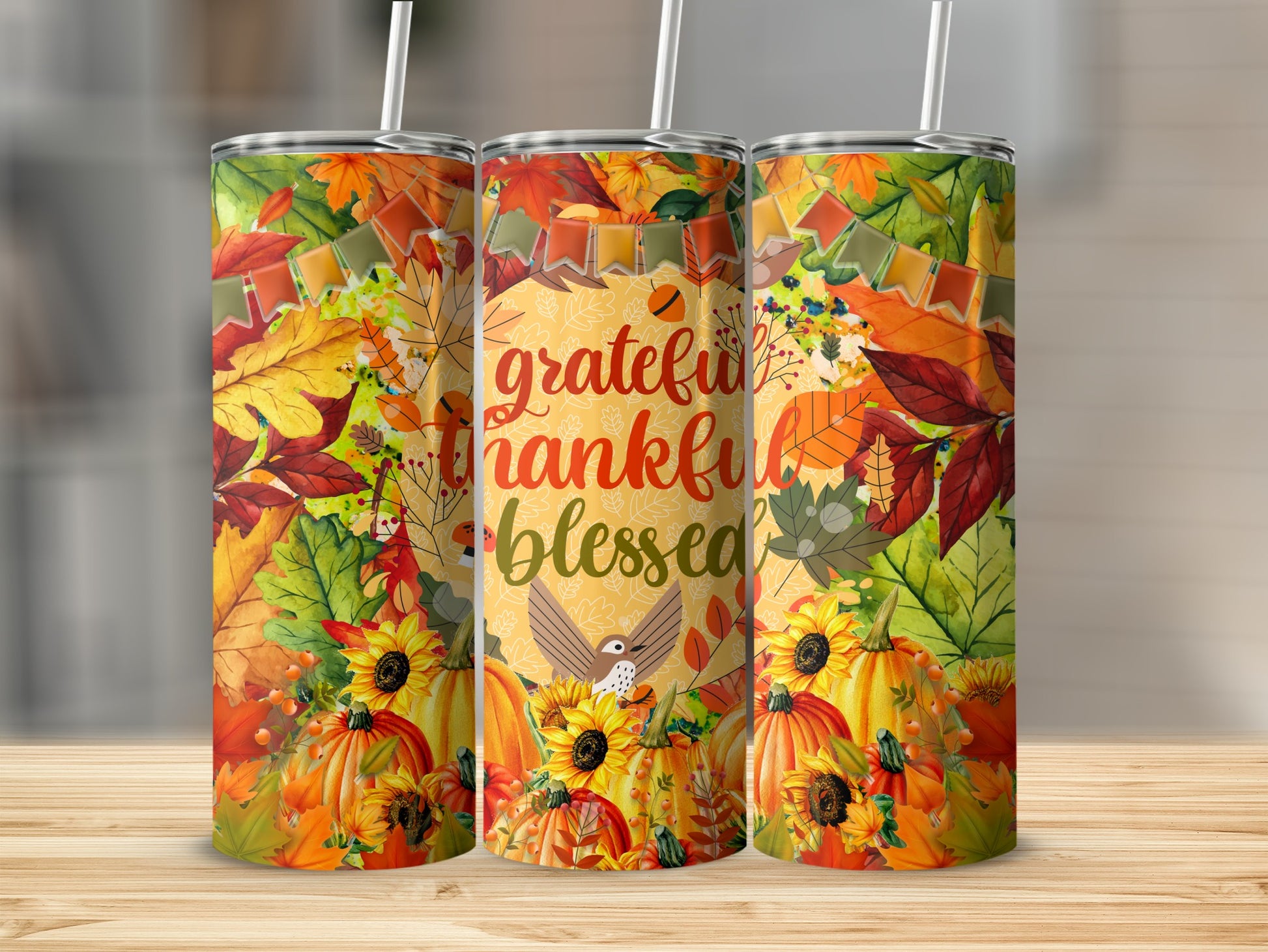 Three tumblers with fall leaves, sunflowers, and "Grateful thankful blessed" text.