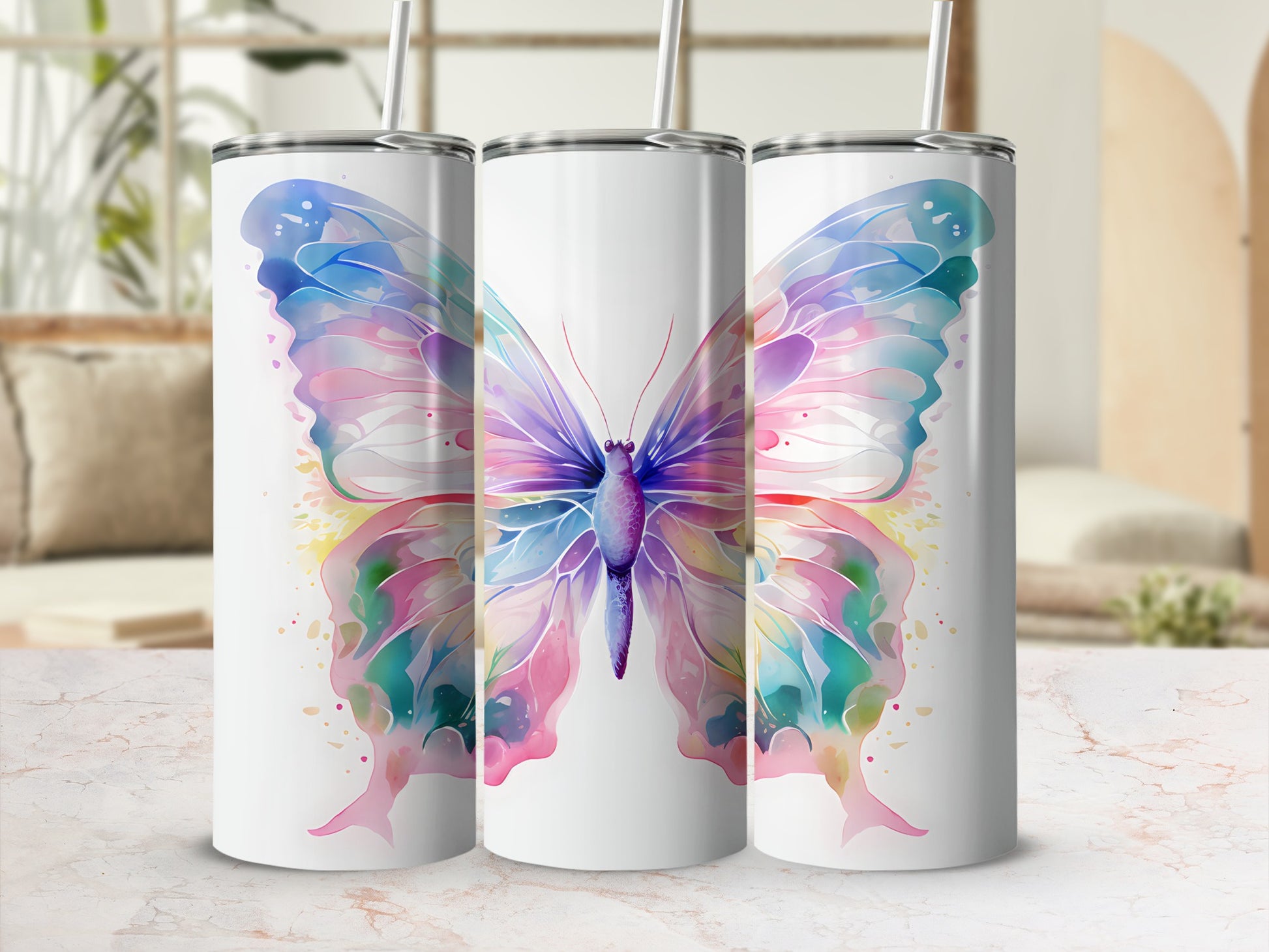 Three white tumblers with watercolor butterfly designs.