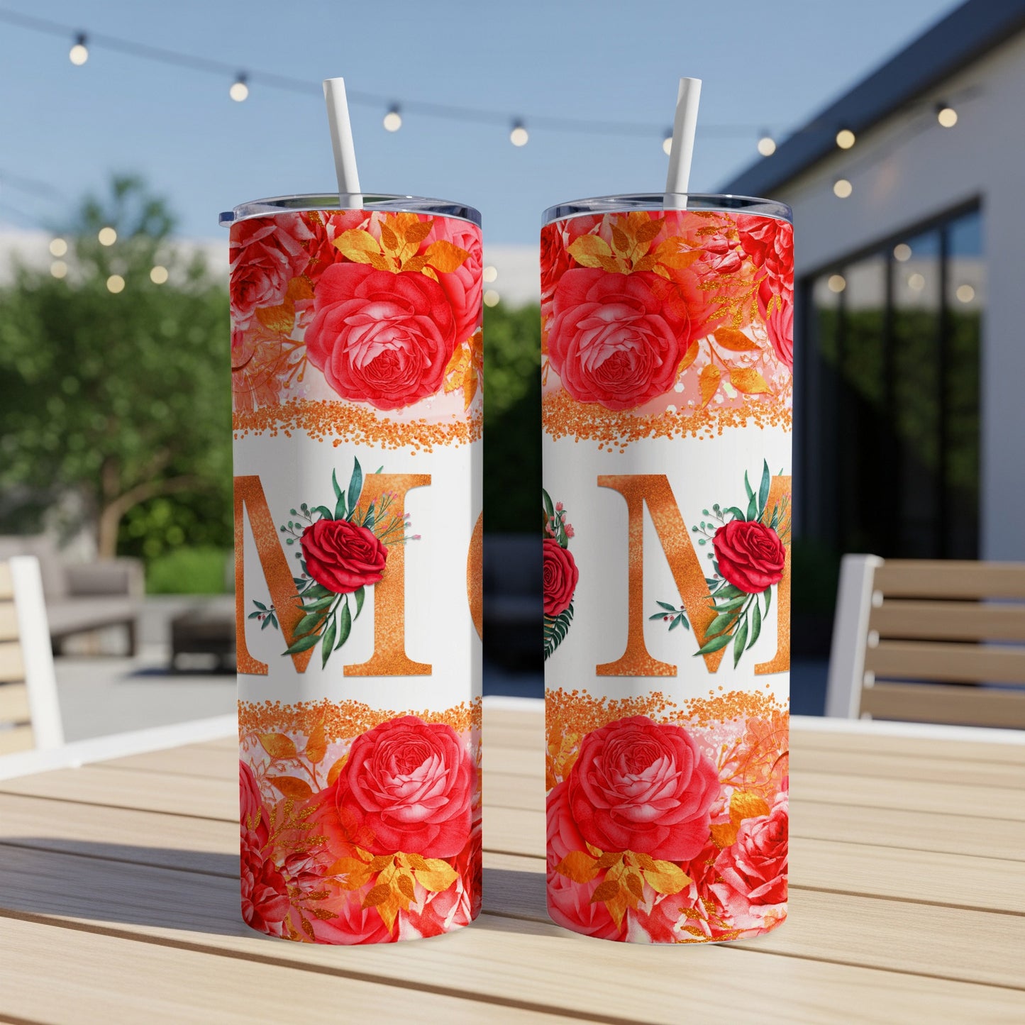 Mom tumbler with red floral pattern and gold glitter accents.