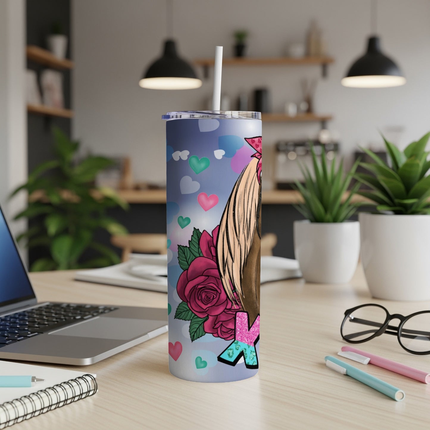Pink and blue heart pattern tumbler with roses and a woman's portrait.