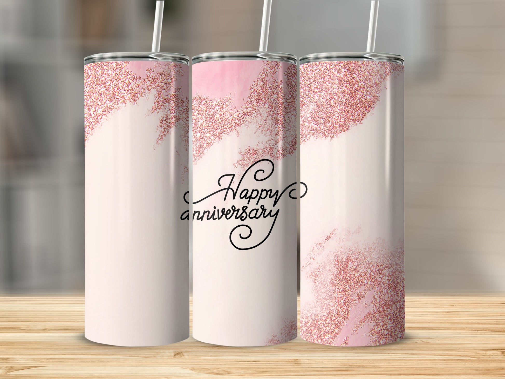 Pink glitter and "Happy Anniversary" text on a skinny tumbler.