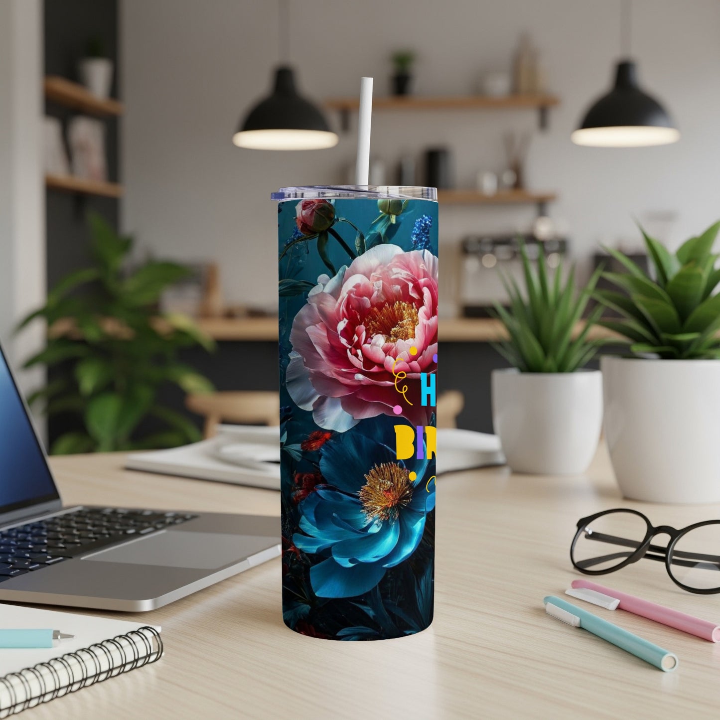 Floral pattern tumbler with "Happy Birthday" text.