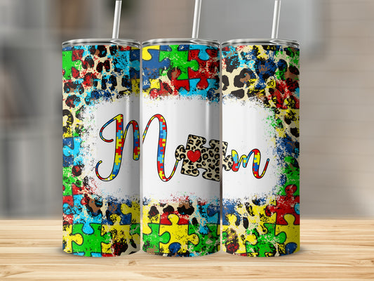 Tumbler with autism puzzle print and "Mom" text in leopard print.