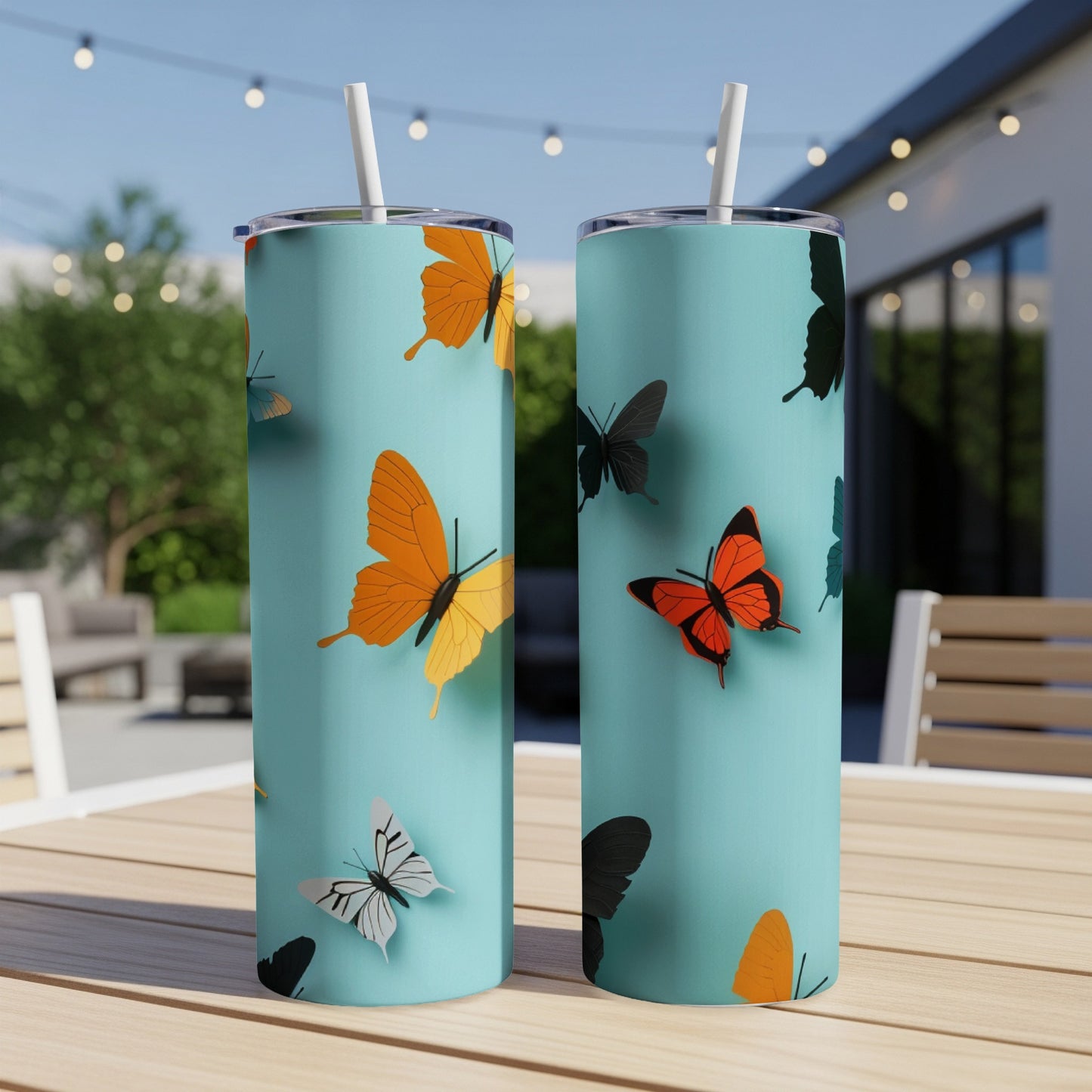 Light blue tumbler with colorful butterflies scattered across it.